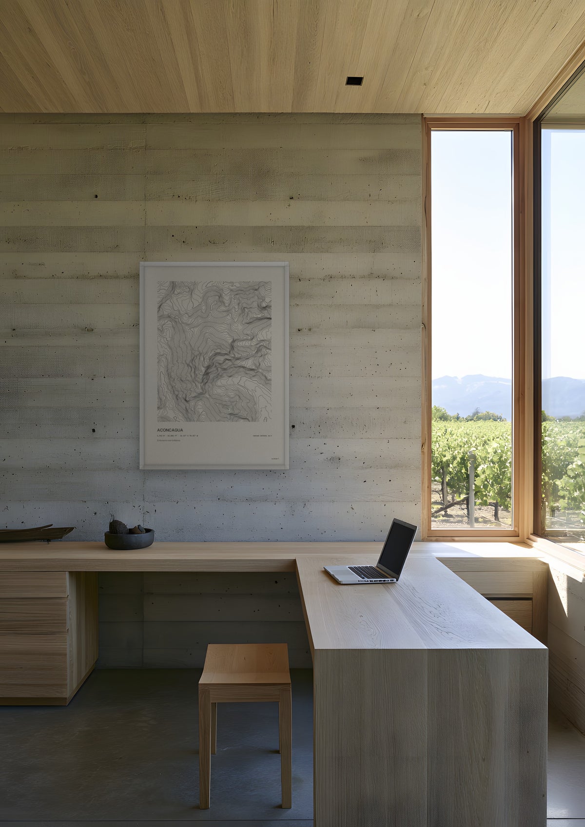 Aconcagua in a white frame, shown in mendoza-winery-office