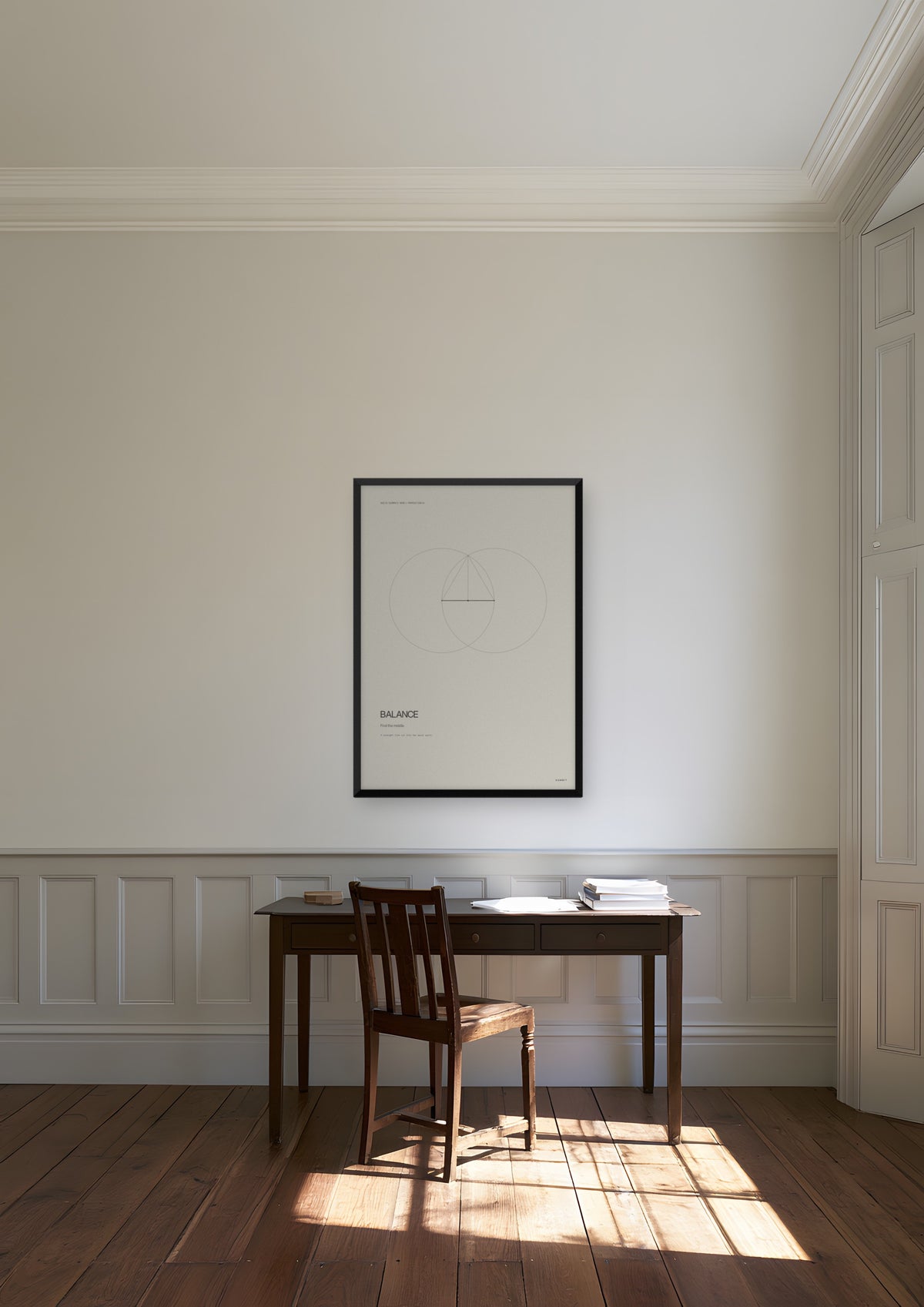 Balance in a black frame, shown in geneva-private-bank-office