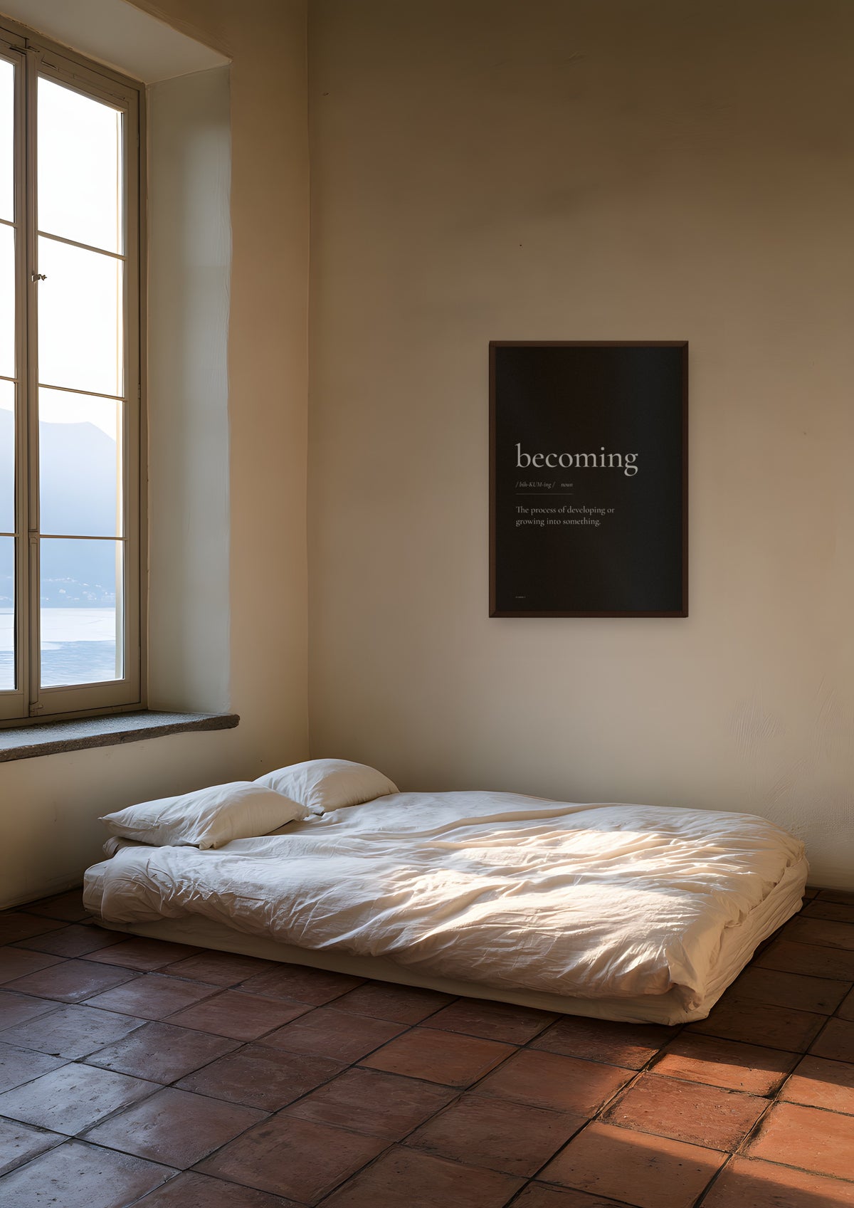 Becoming (Black) in a dark wood frame, shown in lake-como-bedroom
