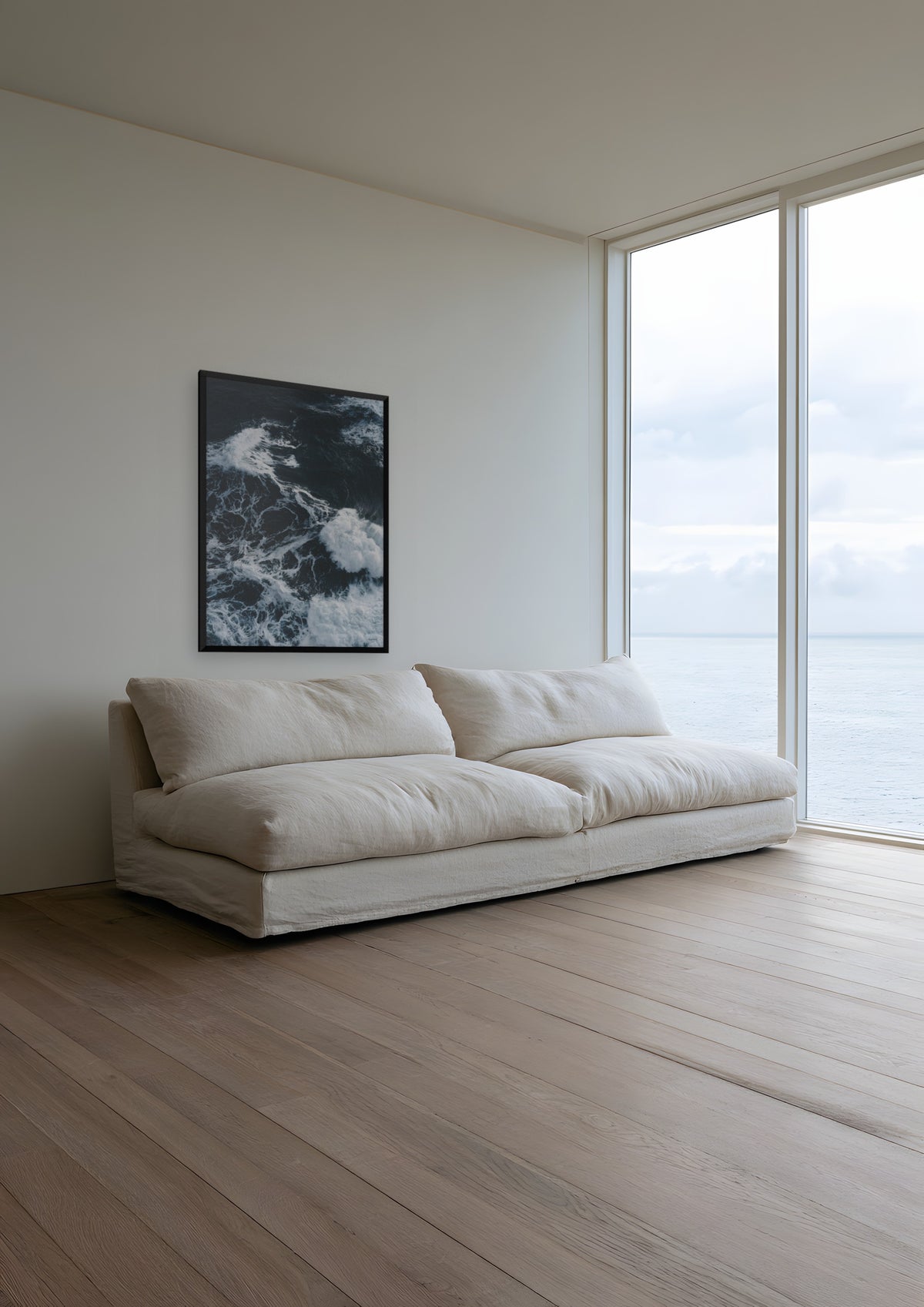 Black Water in a black frame, shown in cornwall-sea-house