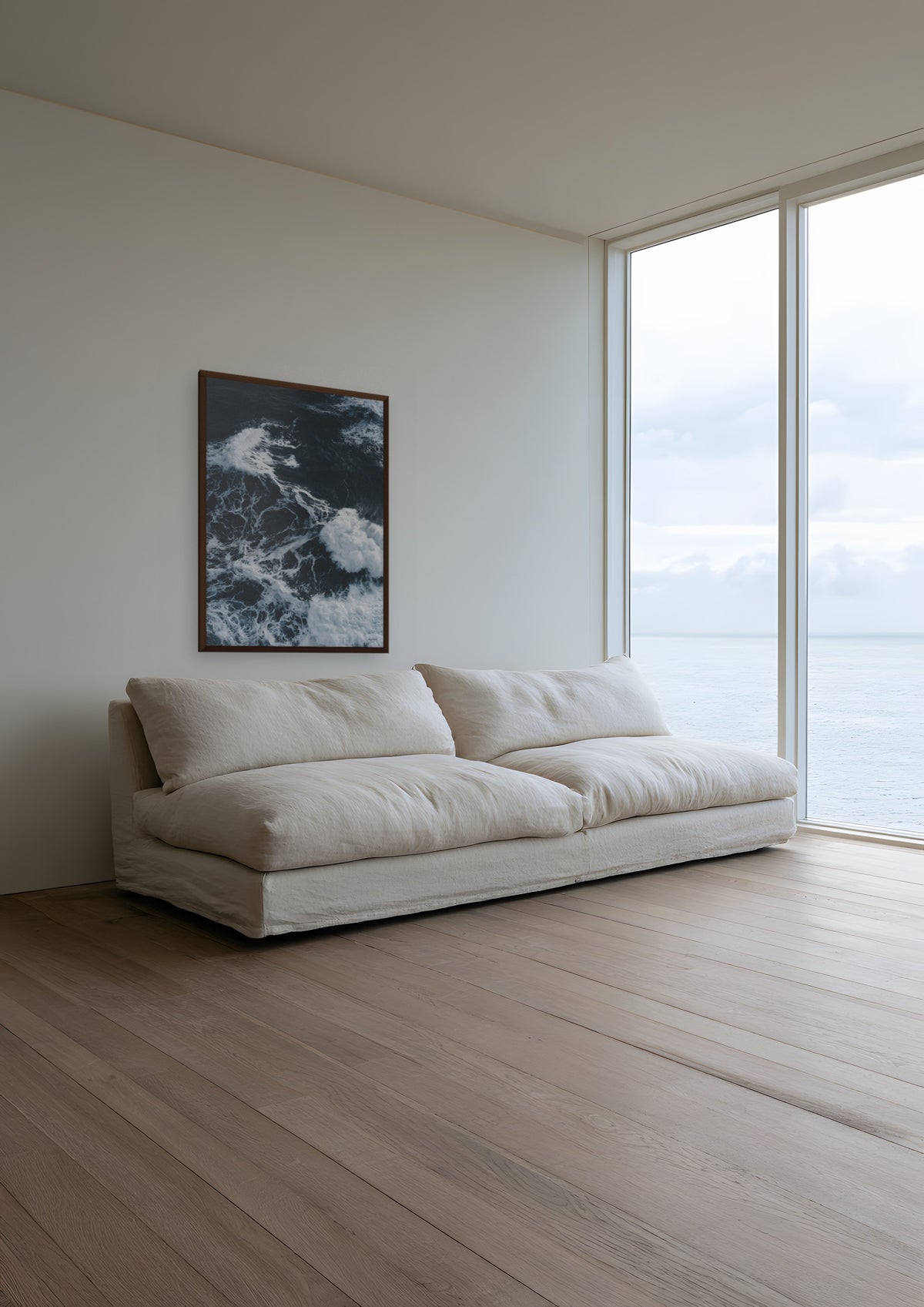 Black Water in a dark wood frame, shown in cornwall-sea-house