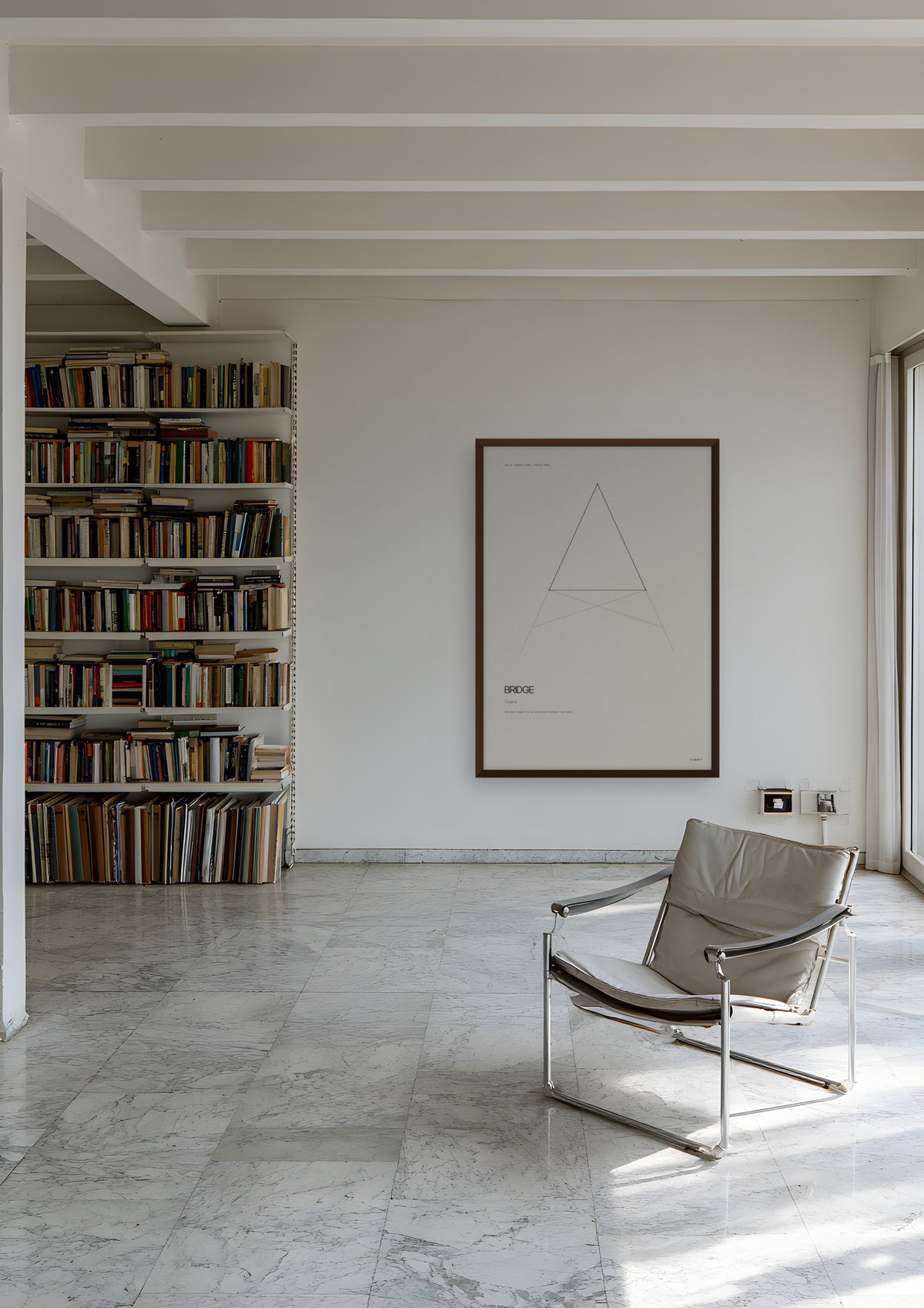 Bridge in a dark wood frame, shown in athens-apartment-library