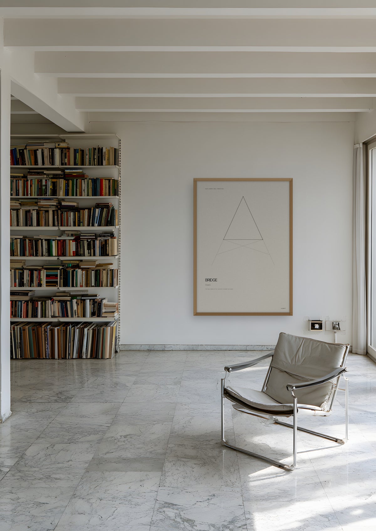 Bridge in a natural wood frame, shown in athens-apartment-library