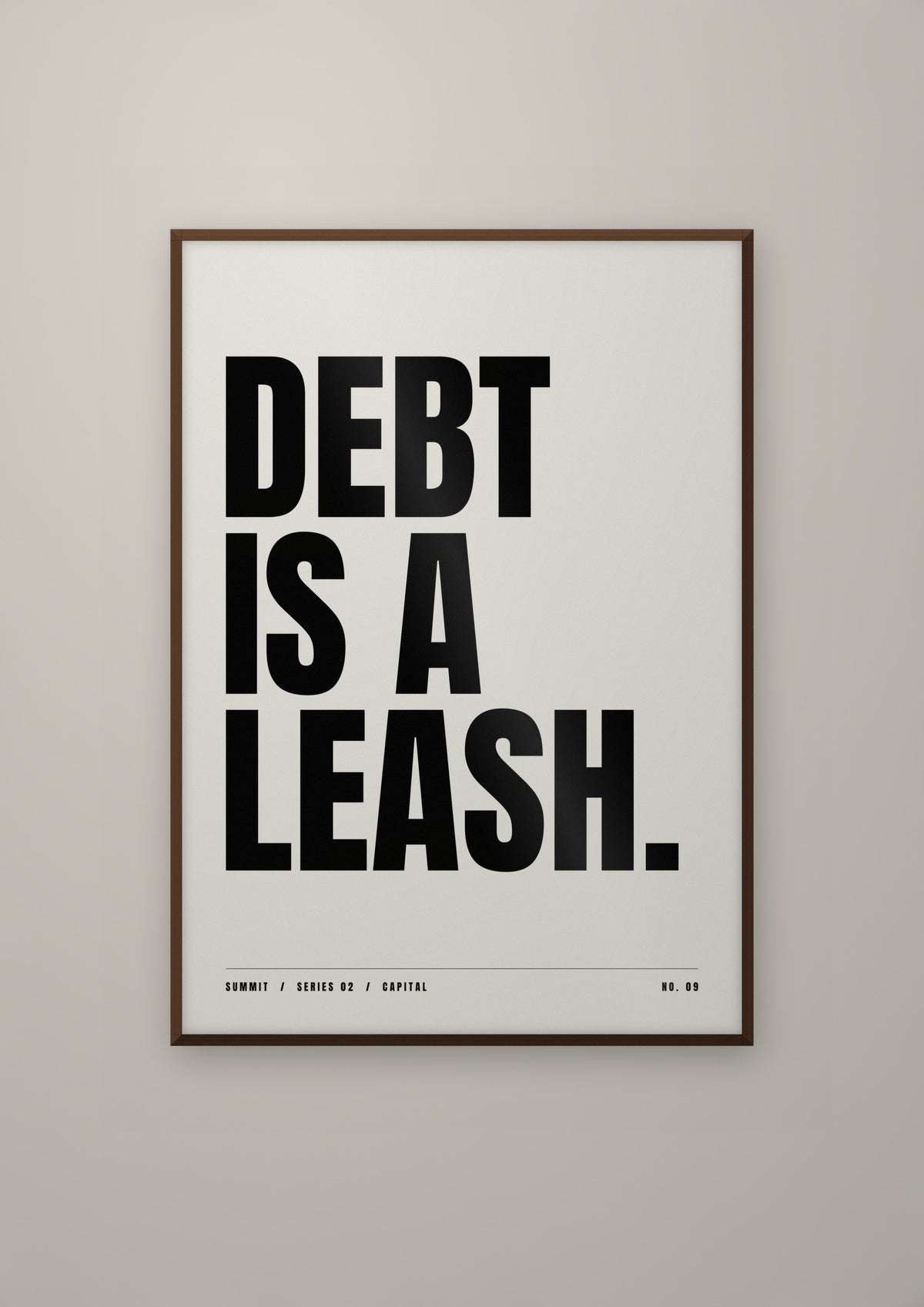 Debt Is a Leash in a dark wood frame
