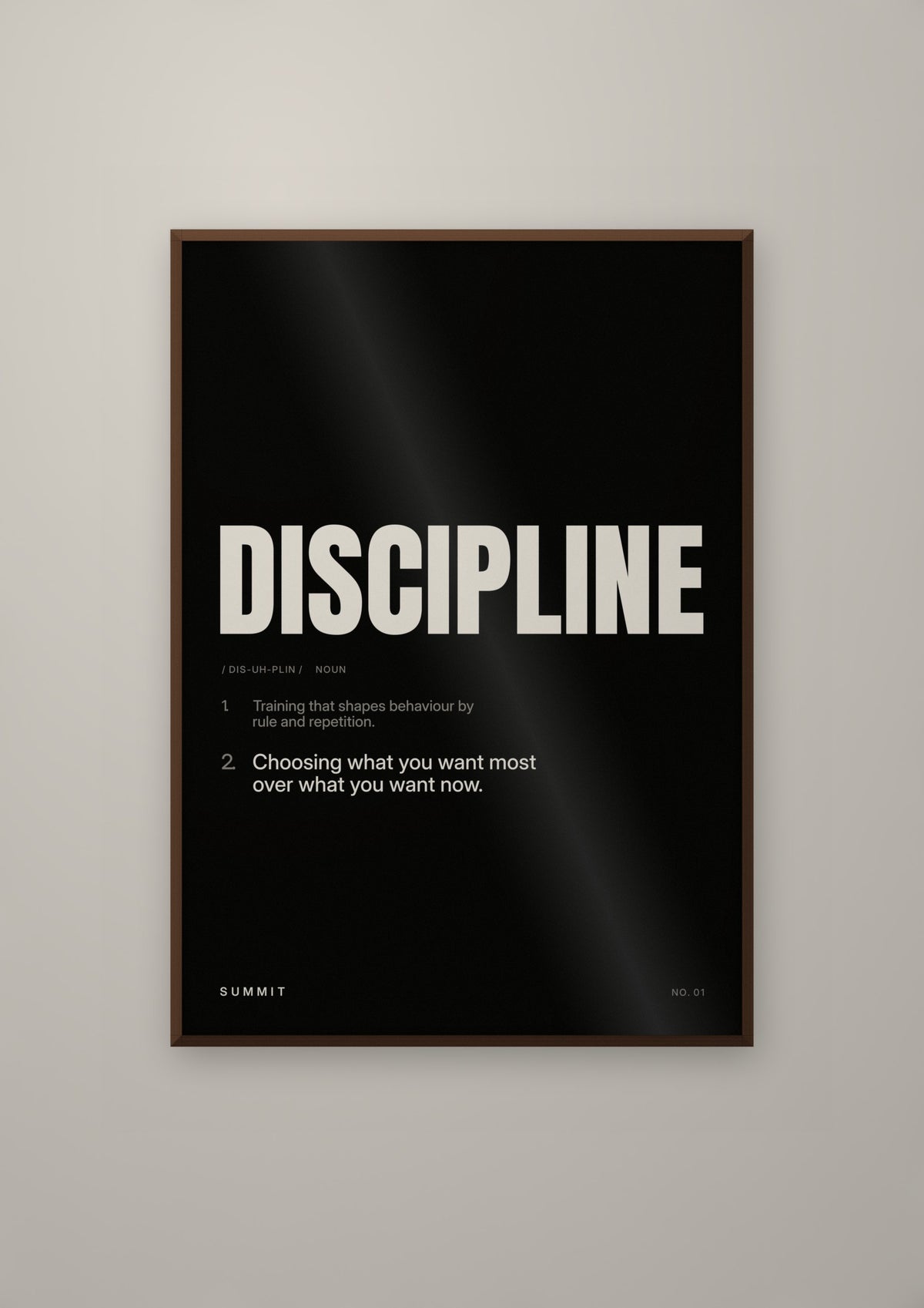 Discipline, Defined (Black) in a dark wood frame