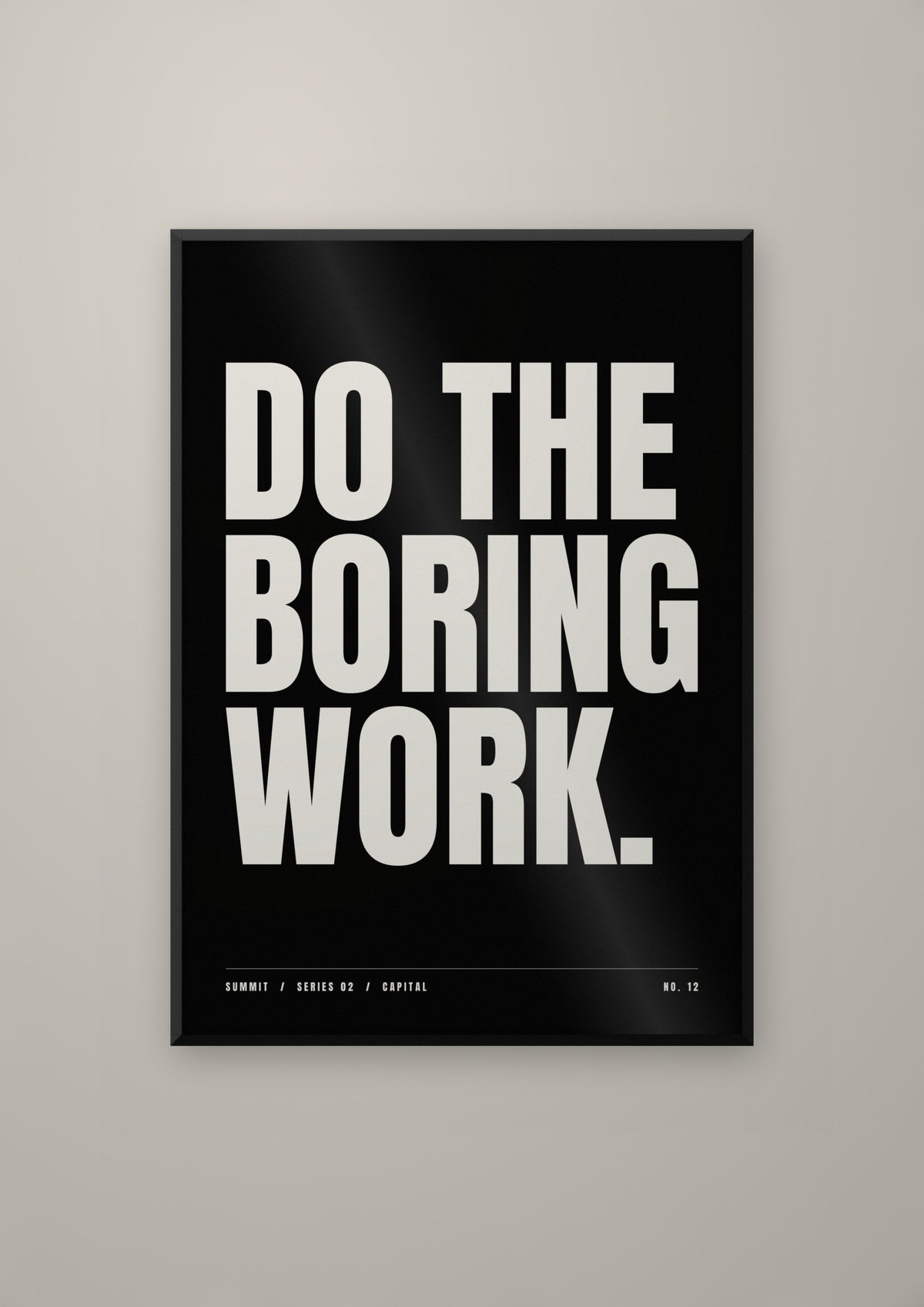 Do the Boring Work in a black frame