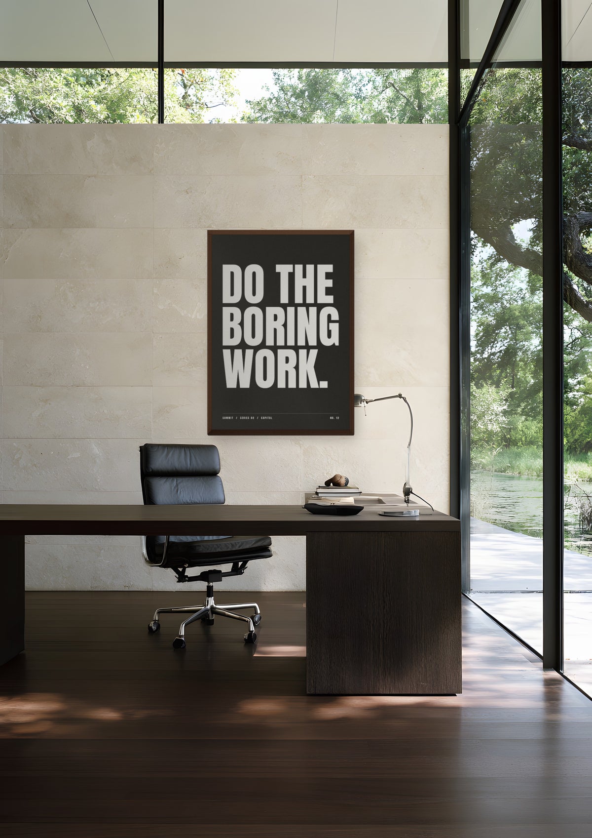 Do the Boring Work in a dark wood frame, shown in glass-stone-residence-ii