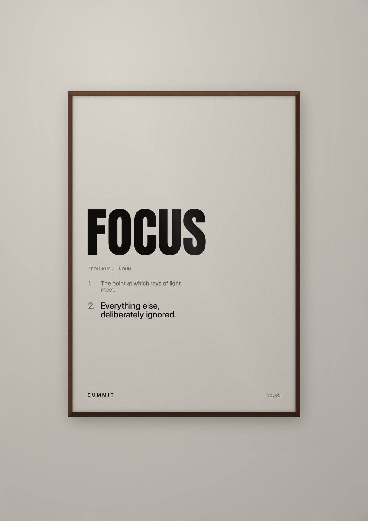 Focus, Defined in a dark wood frame