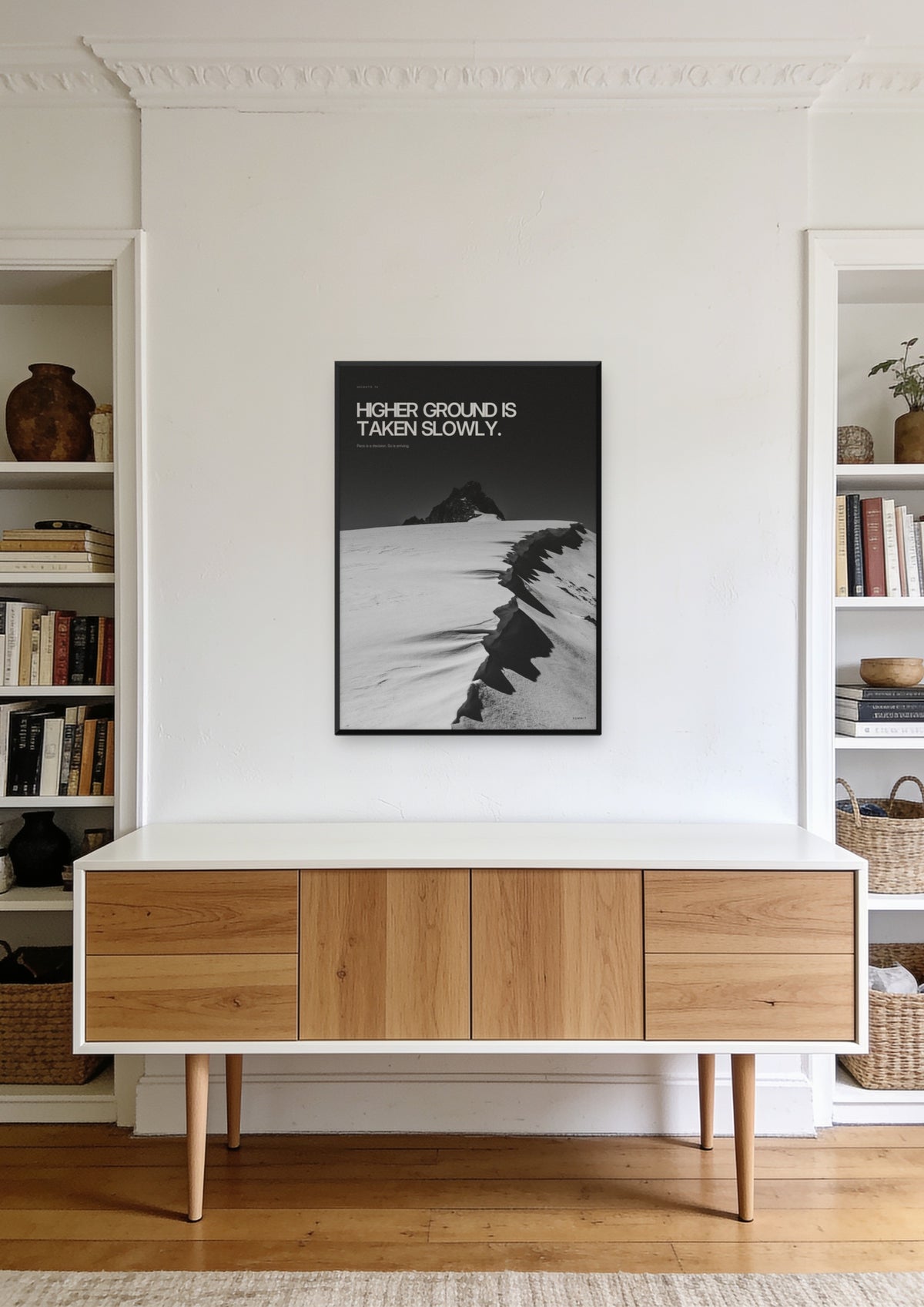 Higher Ground in a black frame, shown in a founder's office