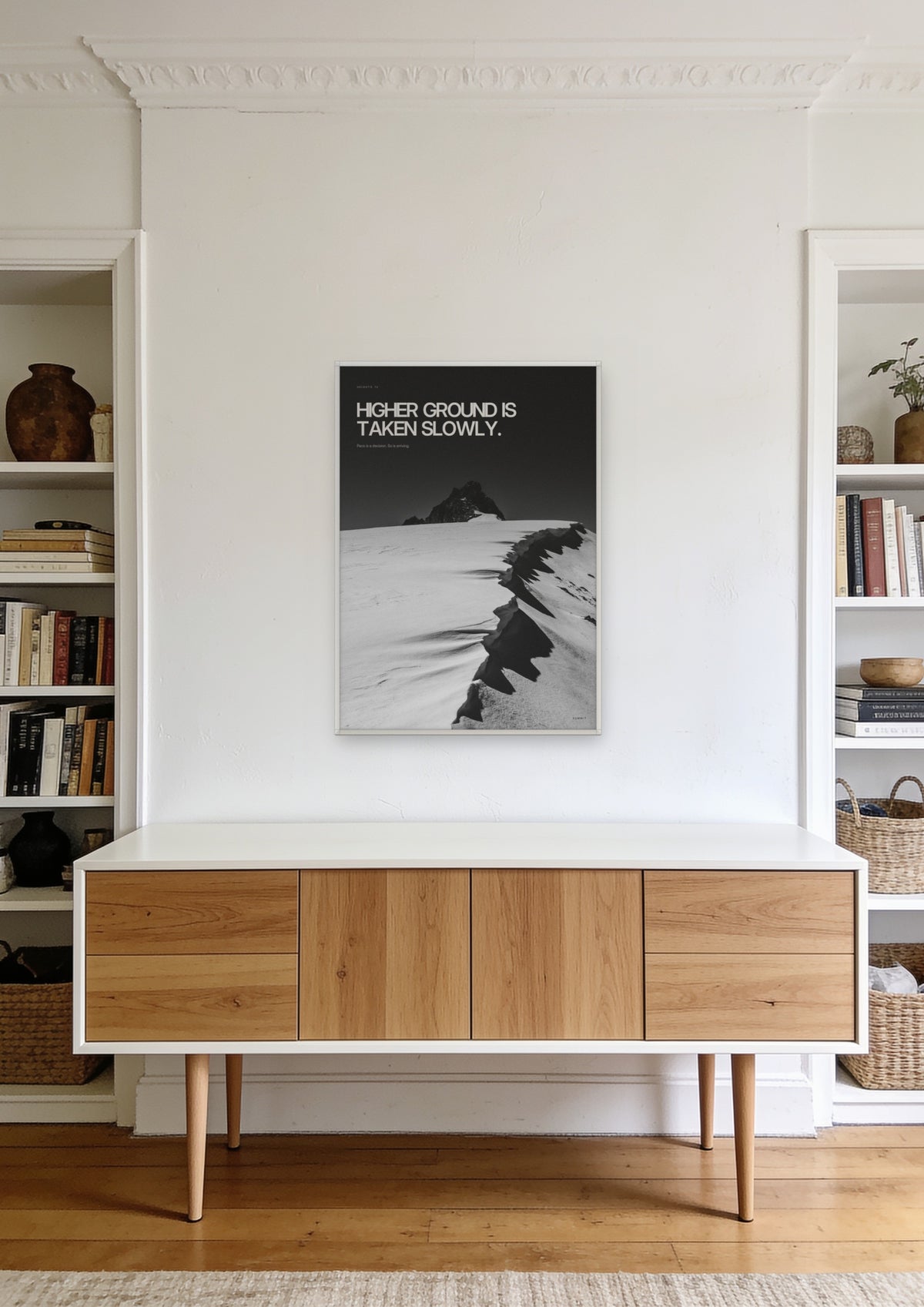 Higher Ground in a white frame, shown in a founder's office