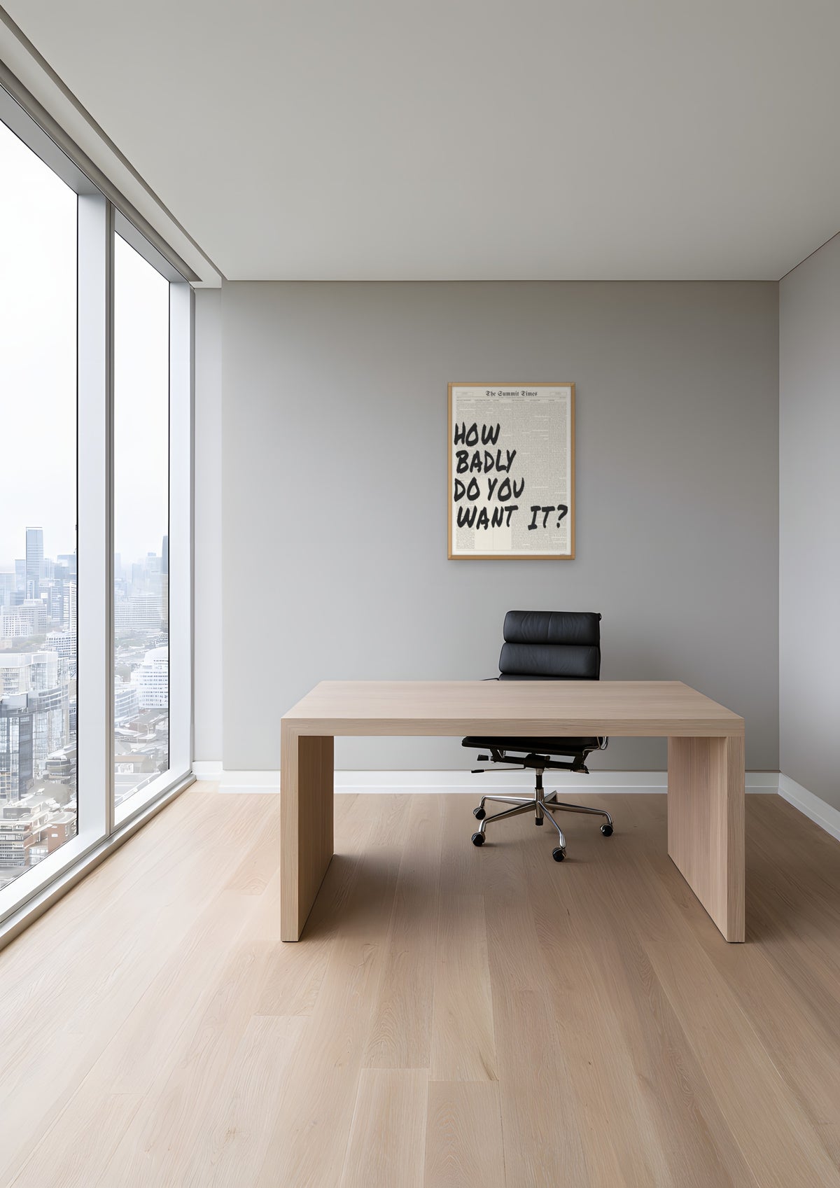 How Badly Do You Want It? in a natural wood frame, shown in toronto-condo-office