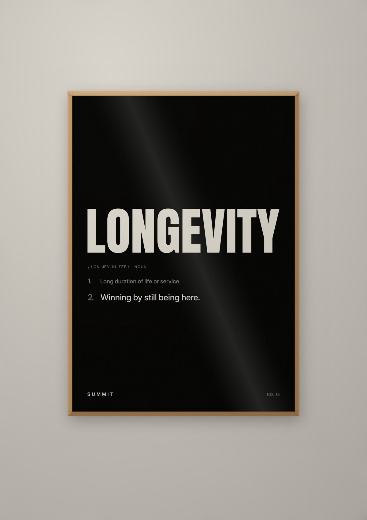 Longevity, Defined (Black) in a natural wood frame