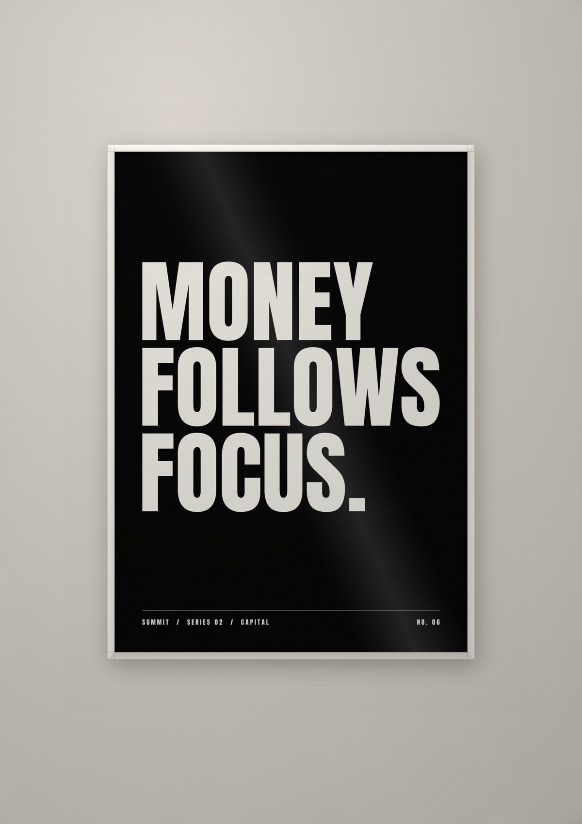 Money Follows Focus in a white frame