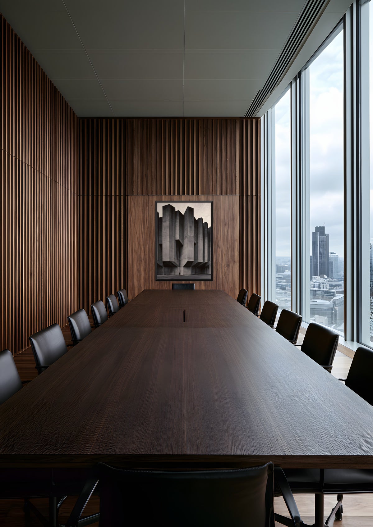 Monolith in a black frame, shown in london-city-boardroom