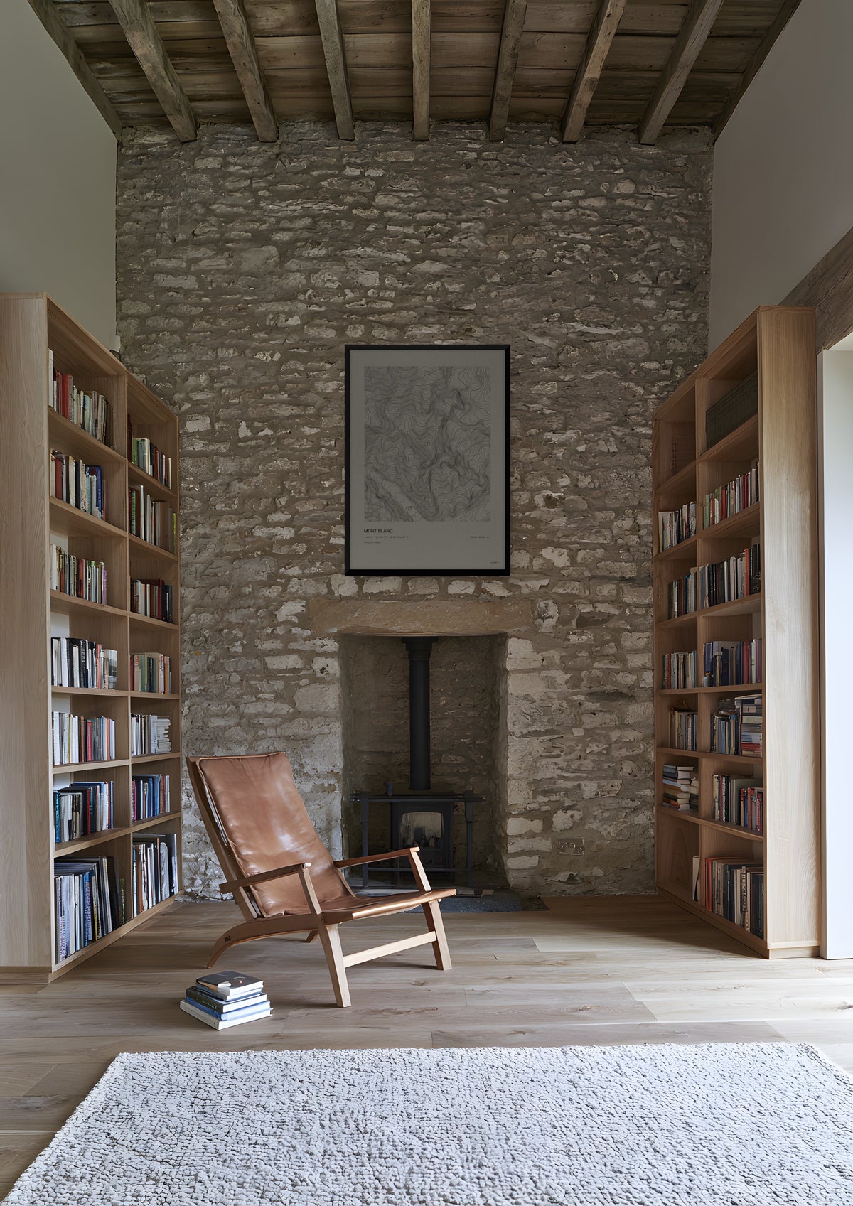 Mont Blanc in a black frame, shown in aspen-chalet-library
