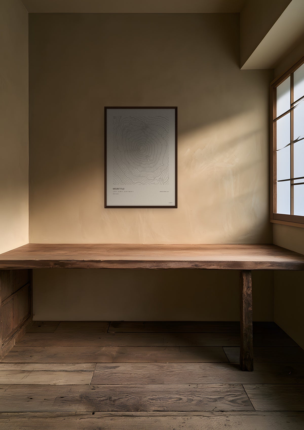 Mount Fuji in a dark wood frame, shown in kyoto-machiya-study
