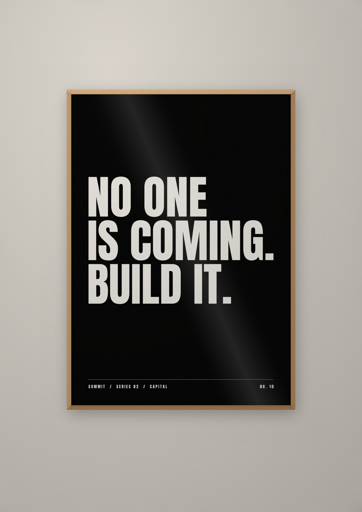 No One Is Coming. Build It. in a natural wood frame
