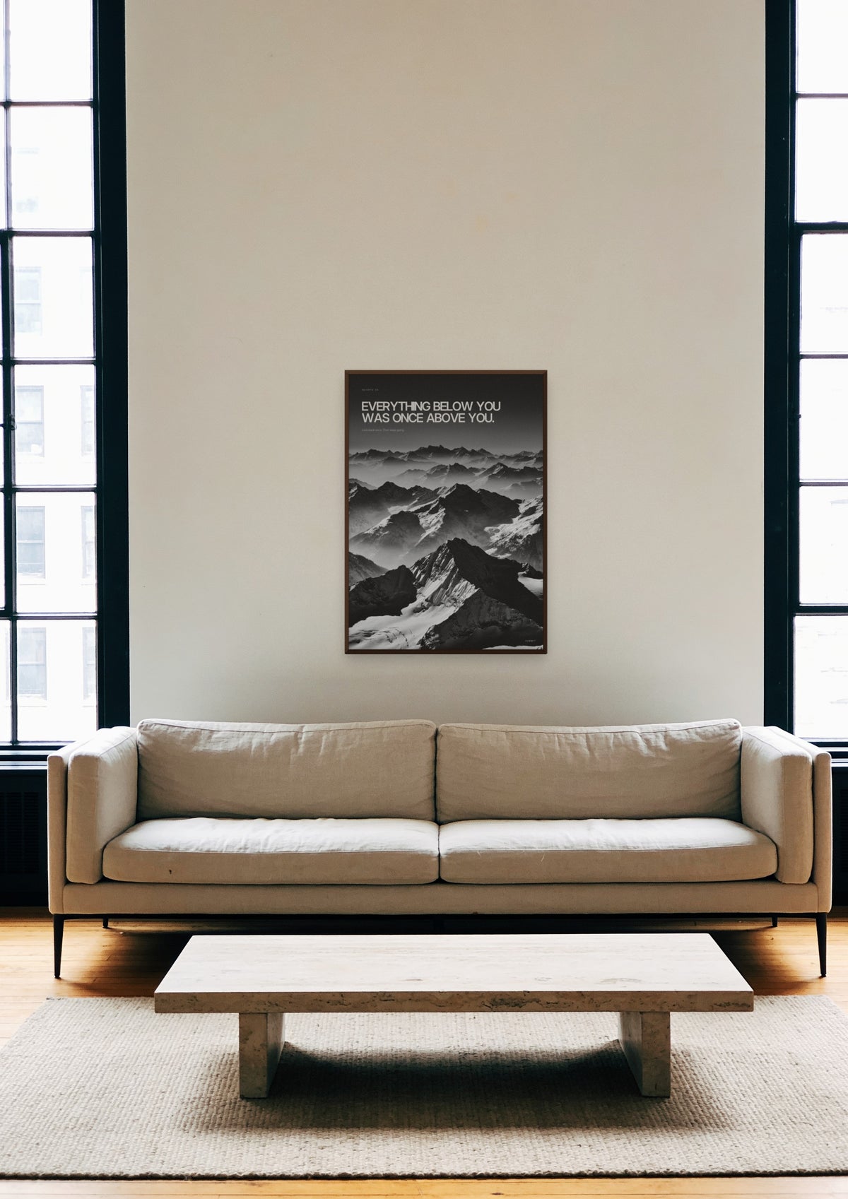 Once Above You in a dark wood frame, shown in a Tribeca loft living room