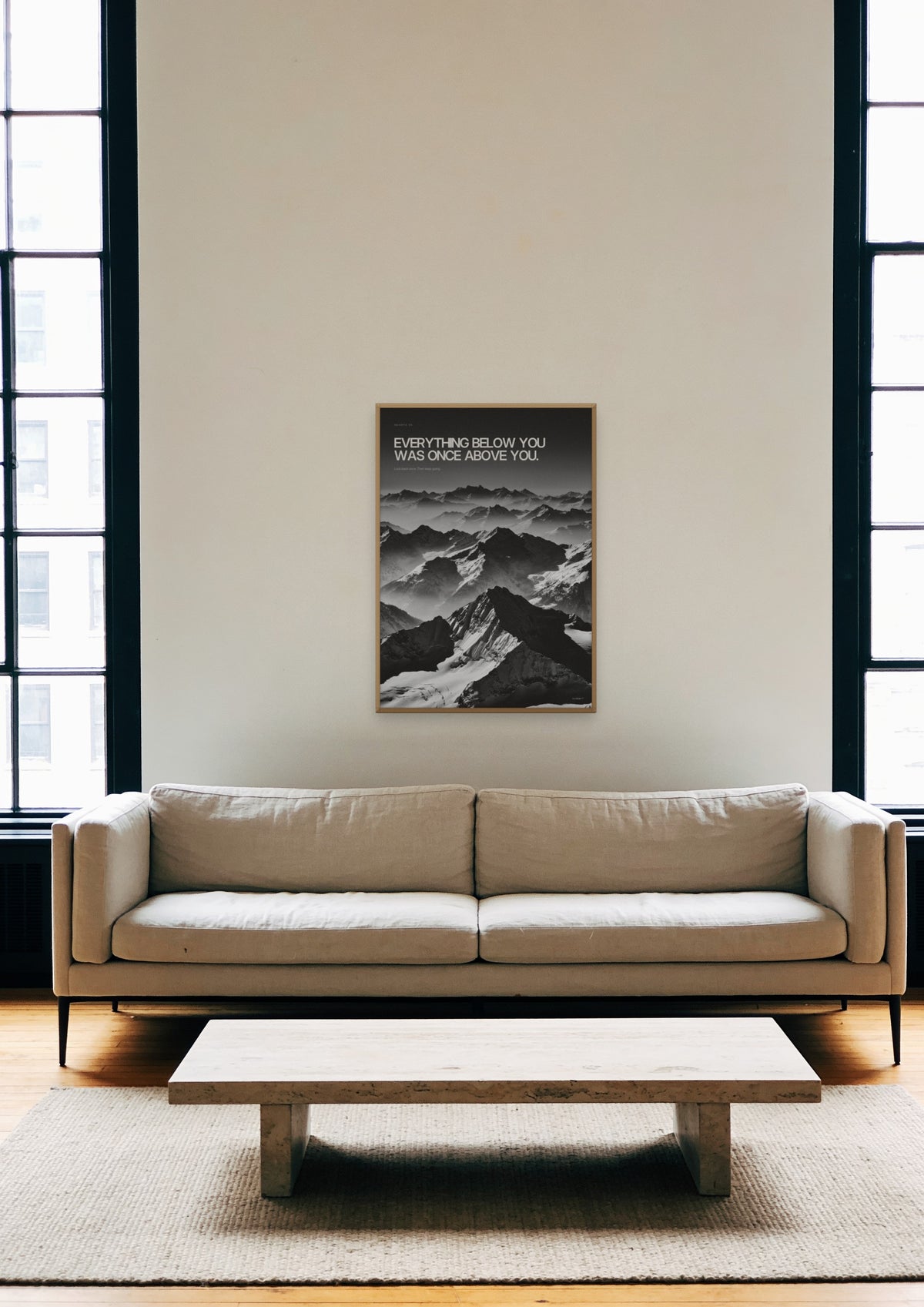 Once Above You in a natural wood frame, shown in a Tribeca loft living room