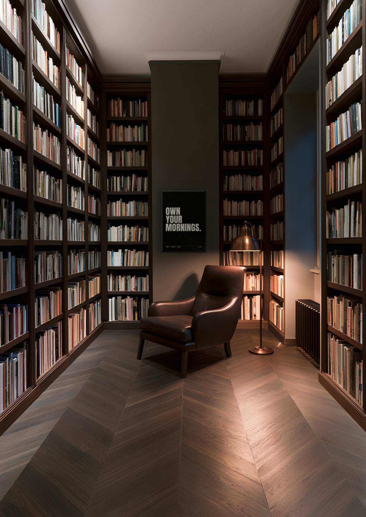 Own Your Mornings in a black frame, shown in a private library at dusk