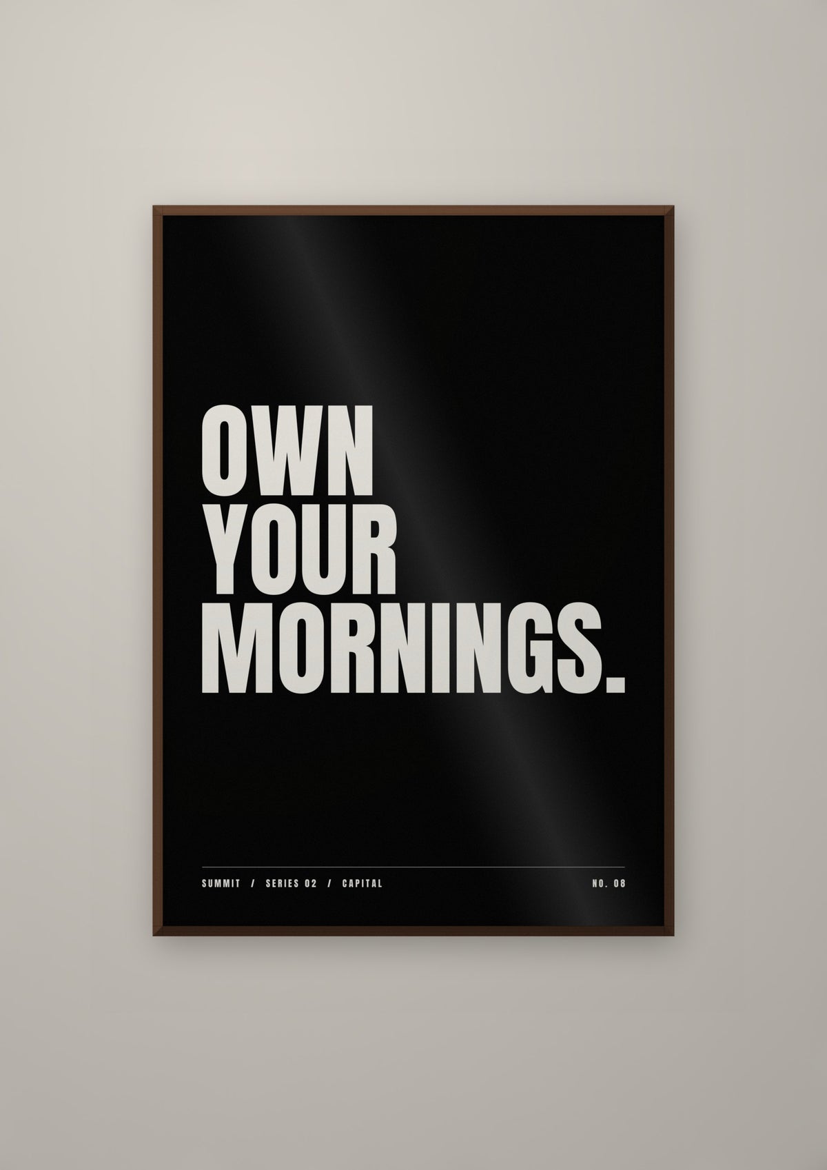 Own Your Mornings in a dark wood frame