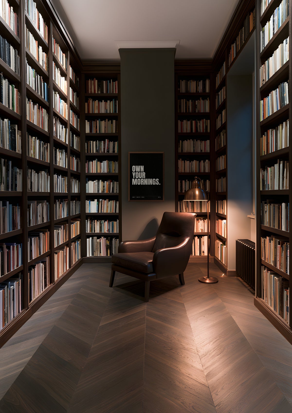 Own Your Mornings in a dark wood frame, shown in a private library at dusk