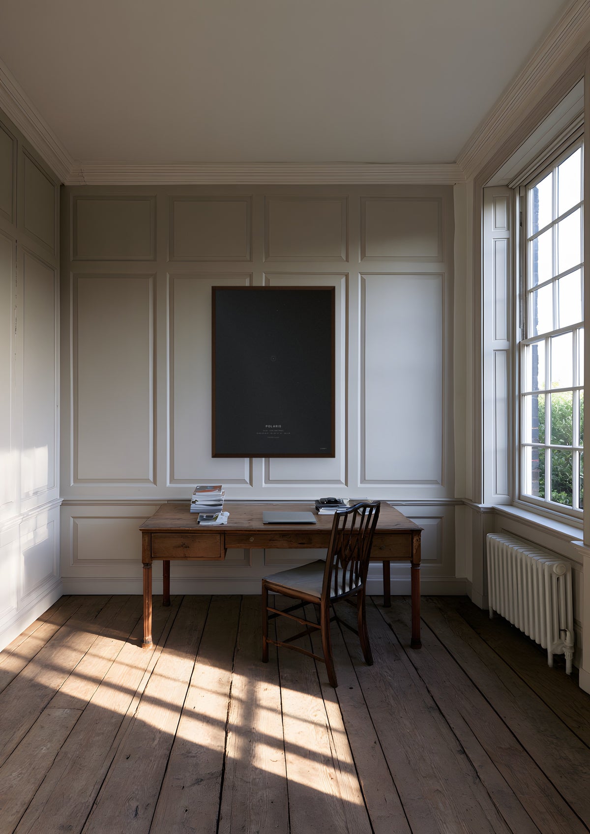 Polaris in a dark wood frame, shown in nantucket-captains-study