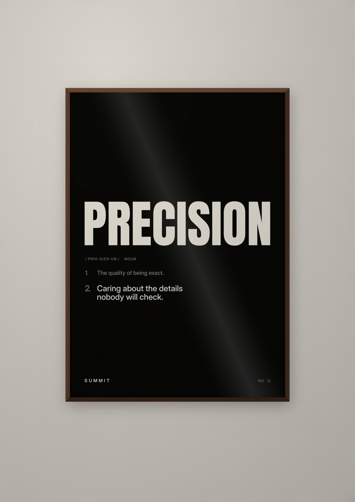 Precision, Defined (Black) in a dark wood frame
