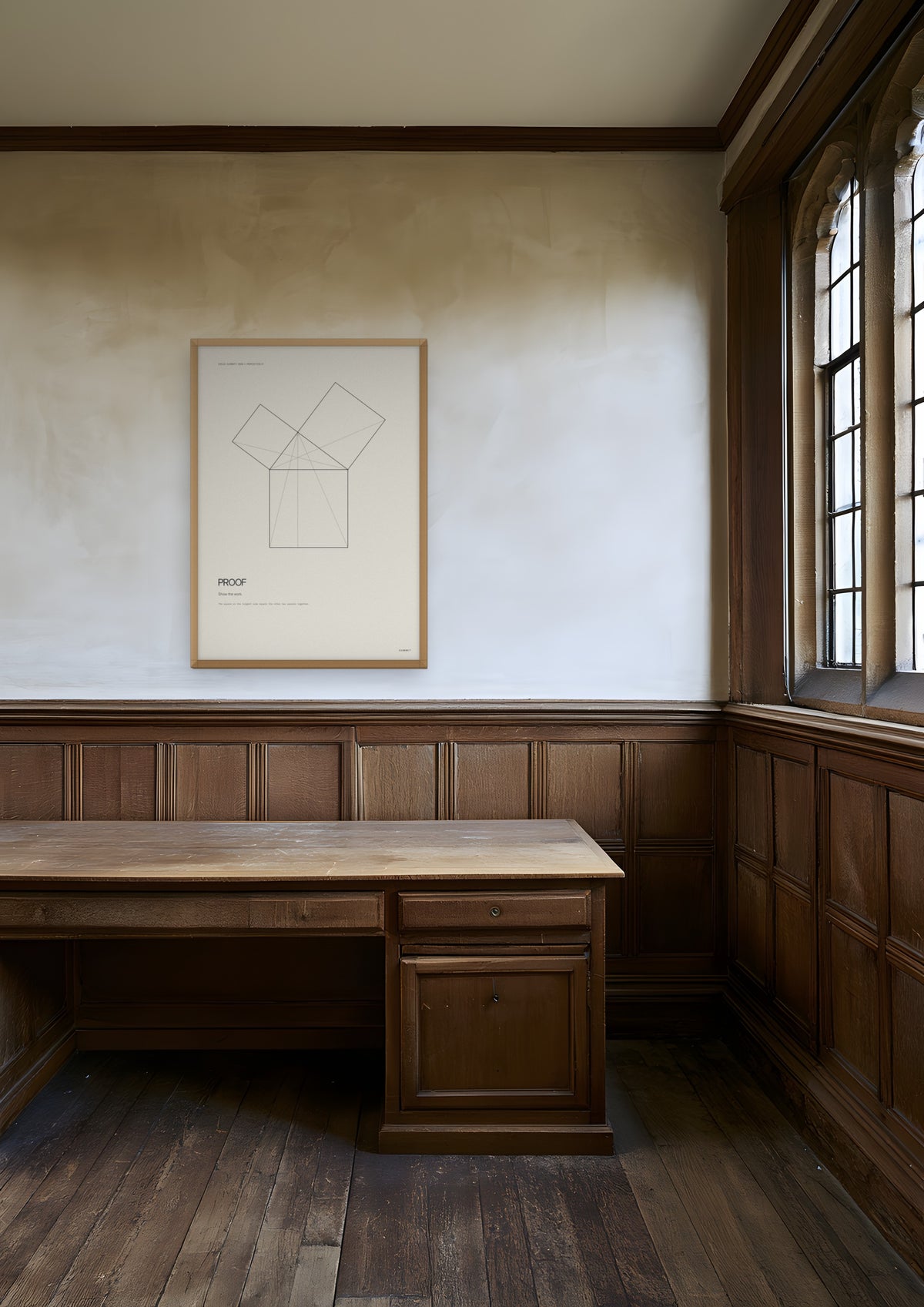 Proof in a natural wood frame, shown in cambridge-college-study