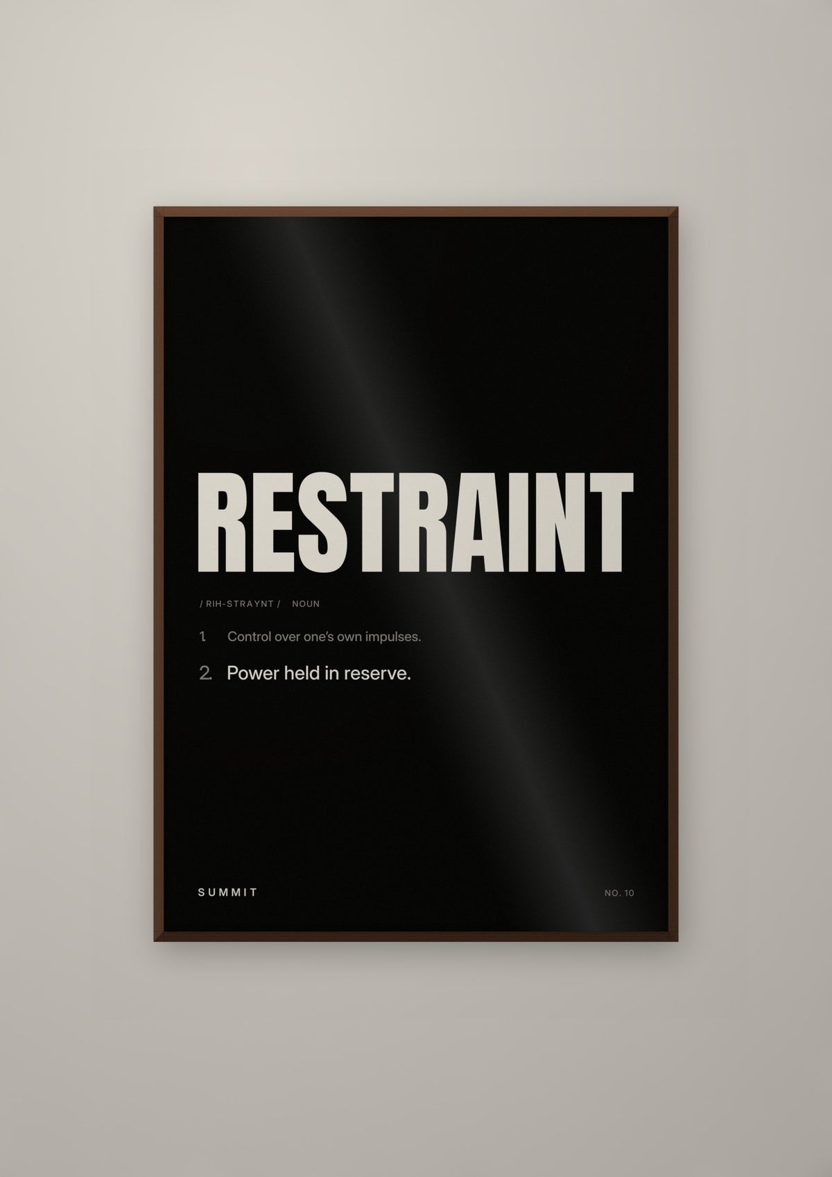 Restraint, Defined (Black) in a dark wood frame