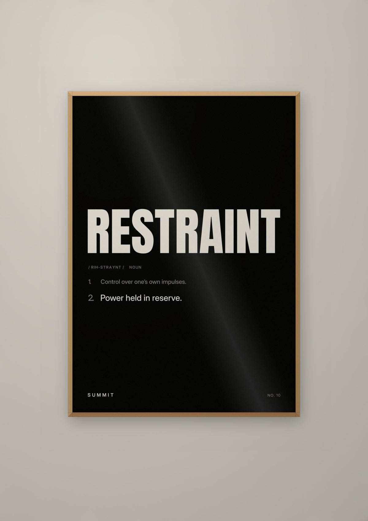 Restraint, Defined (Black) in a natural wood frame
