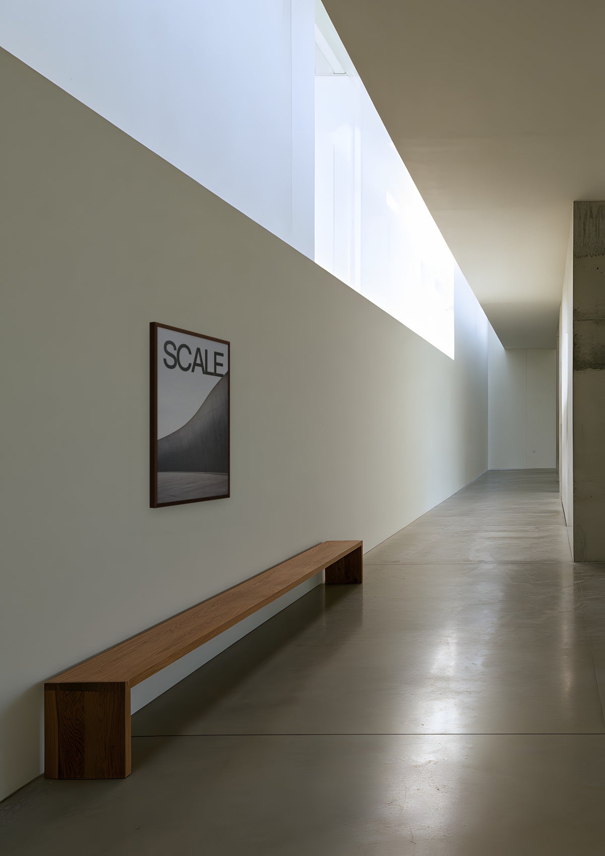 Scale in a dark wood frame, shown in hq-gallery-corridor