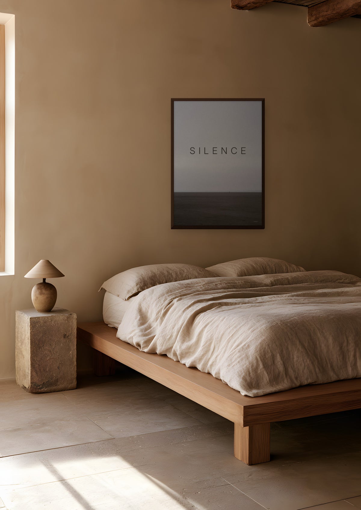 Silence in a dark wood frame, shown in limewash-bedroom