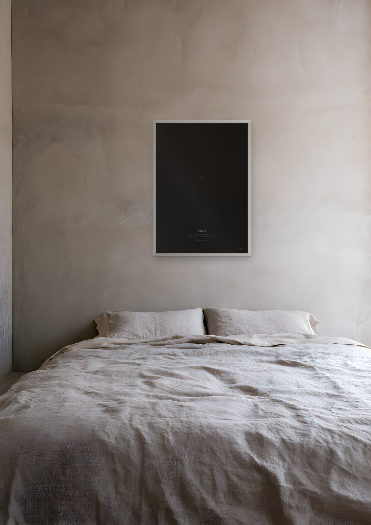 Spica in a white frame, shown in santa-fe-bedroom