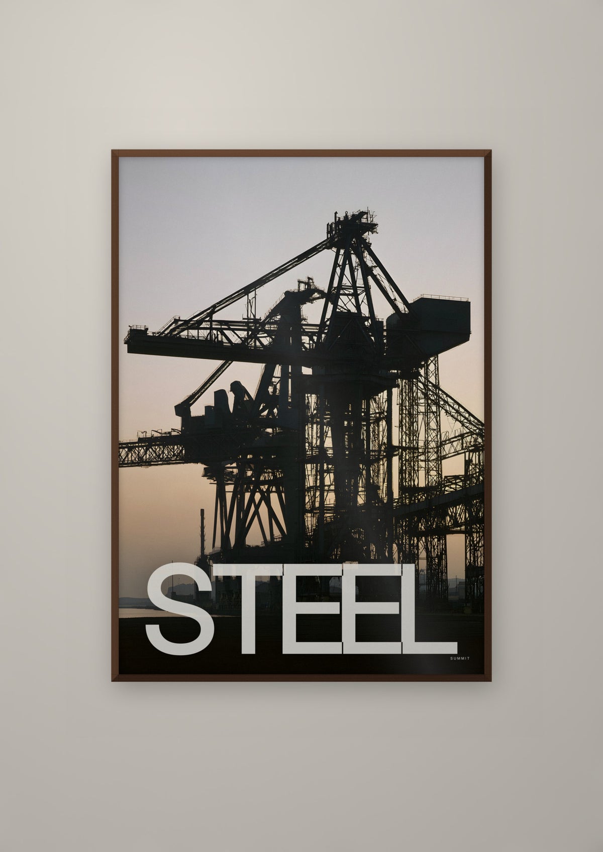 Steel in a dark wood frame