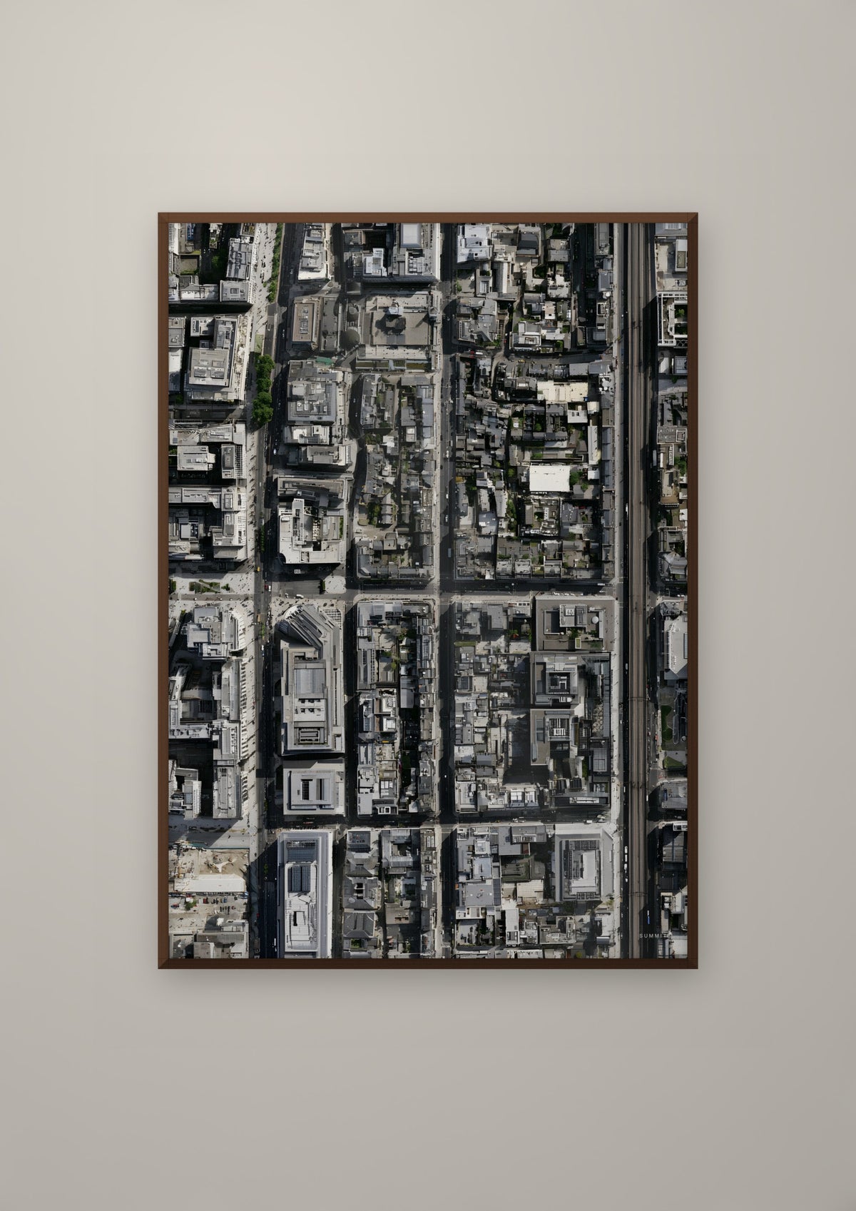 The Grid in a dark wood frame