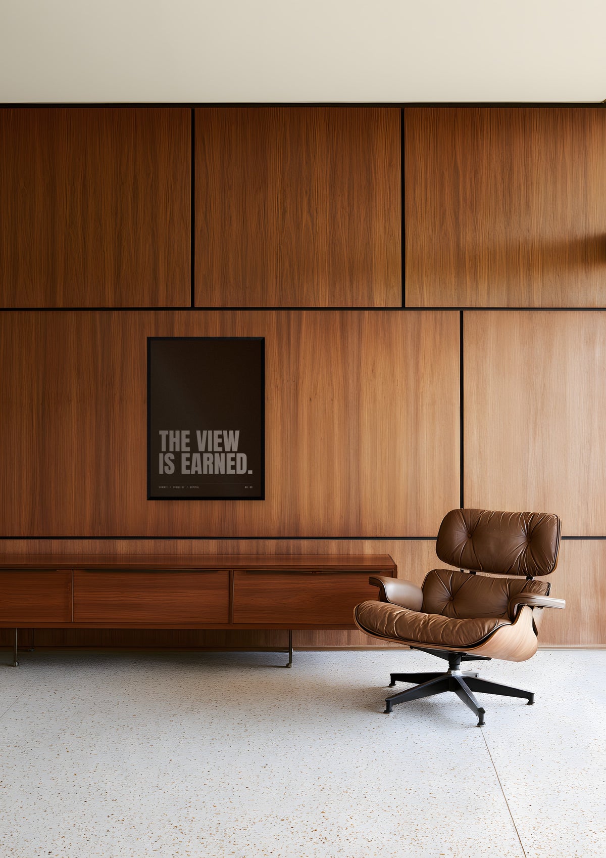 The View Is Earned in a black frame, shown in la-midcentury-house-ii