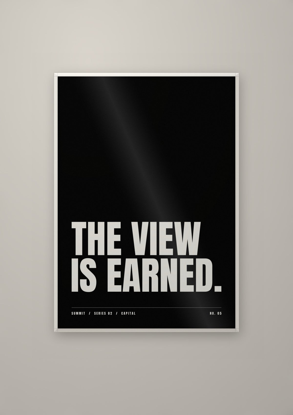 The View Is Earned in a white frame