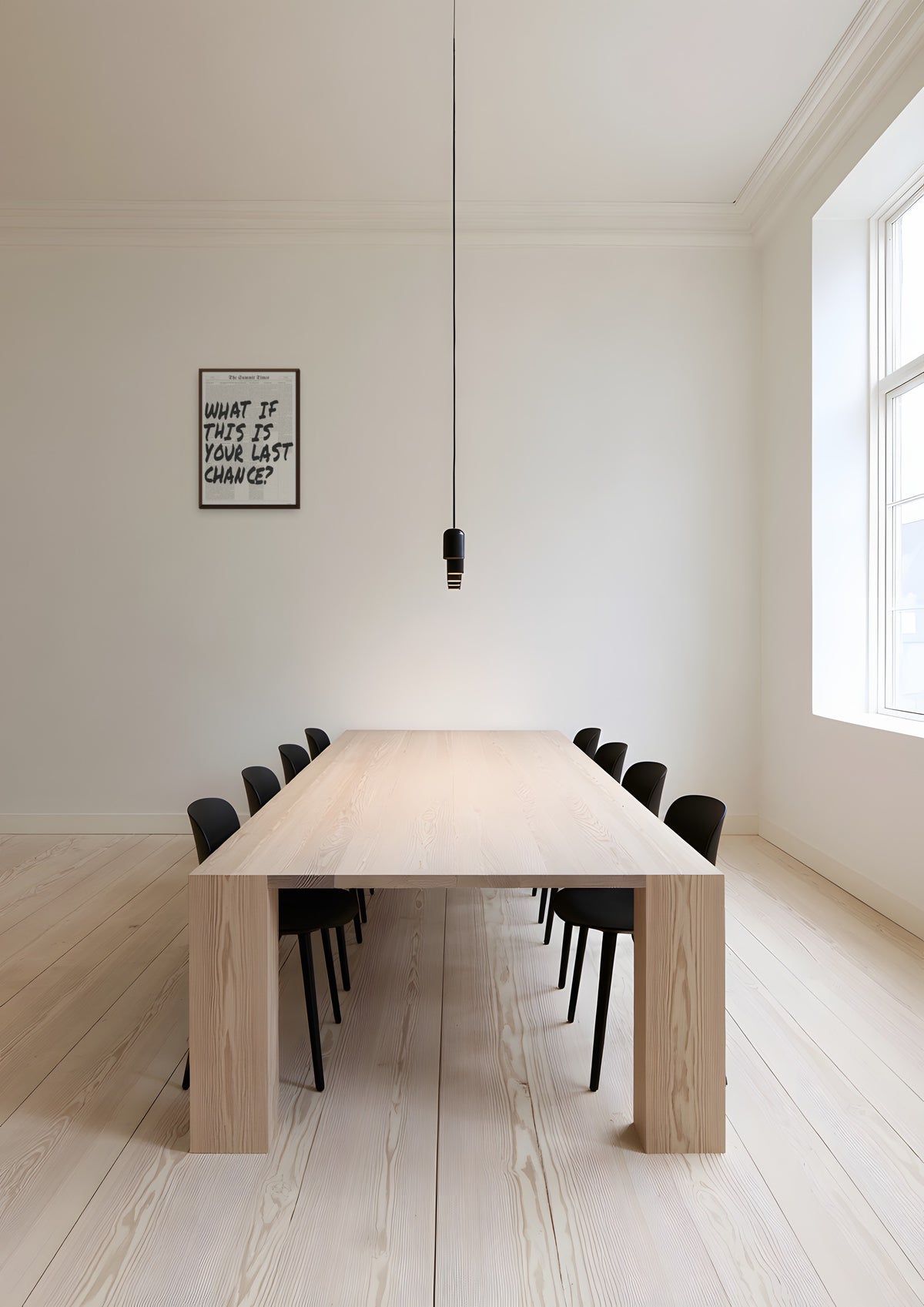 What If This Is Your Last Chance? in a dark wood frame, shown in copenhagen-office