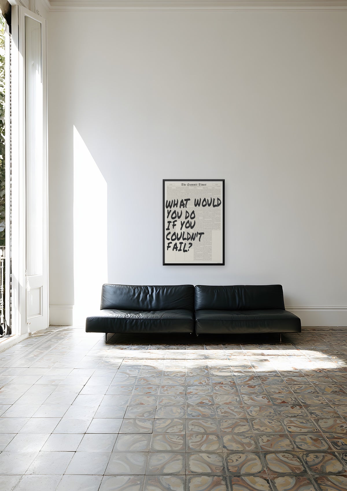 What Would You Do If You Couldn't Fail? in a black frame, shown in barcelona-apartment