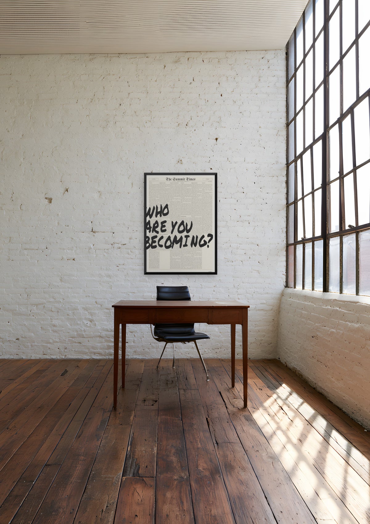 Who Are You Becoming? in a black frame, shown in brooklyn-loft-office